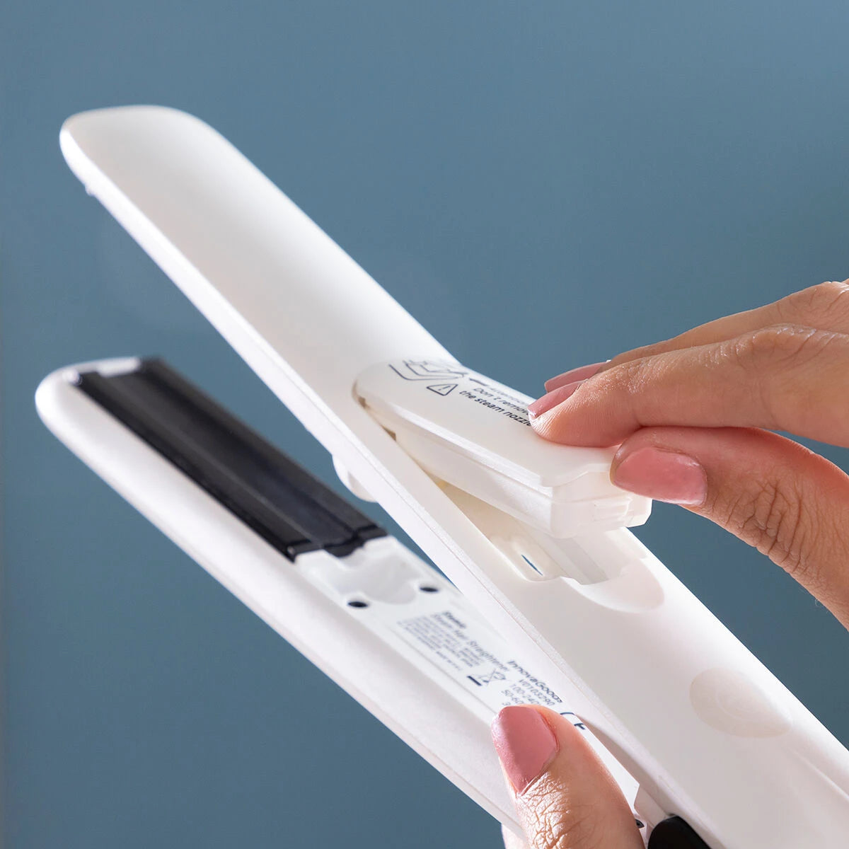 Ceramic Hair Iron with Steam Stemio InnovaGoods 36 W product packaging